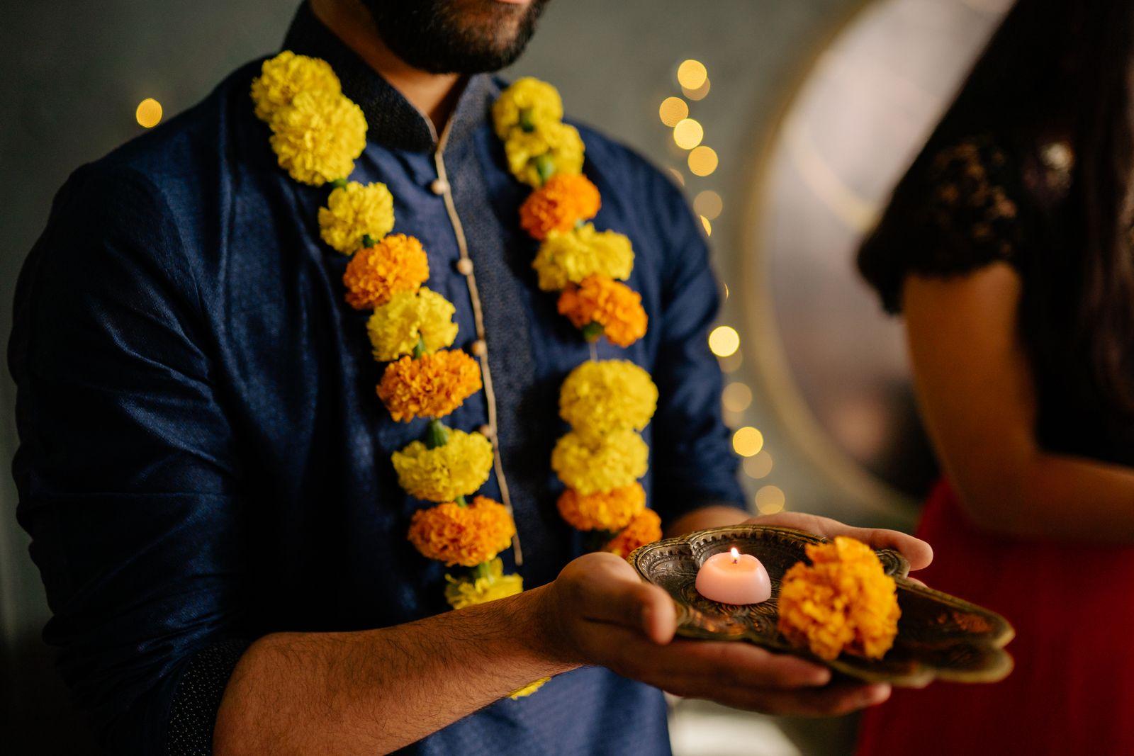 Fresh marigold flowers held on a plate for a festival