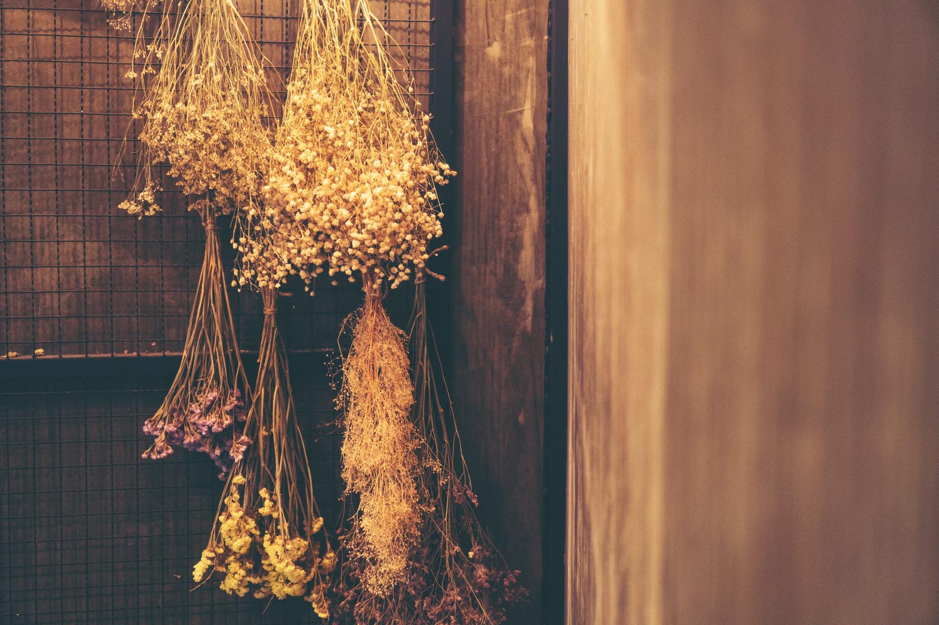 Bouquet of dried lavender tied and resting on a rustic table