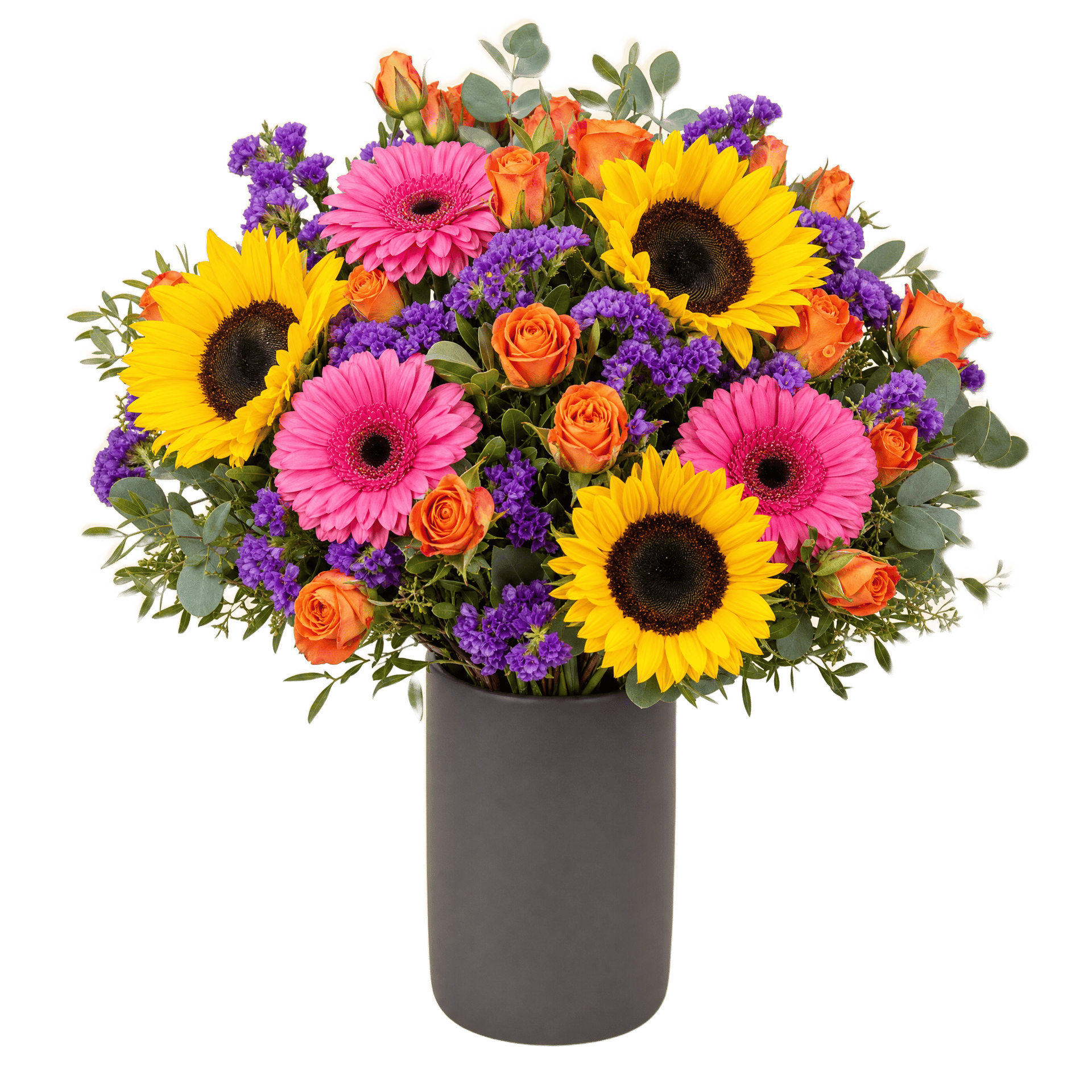 Bright celebration bouquet of sunflowers, pink gerberas, orange spray roses and purple statice in a charcoal vase